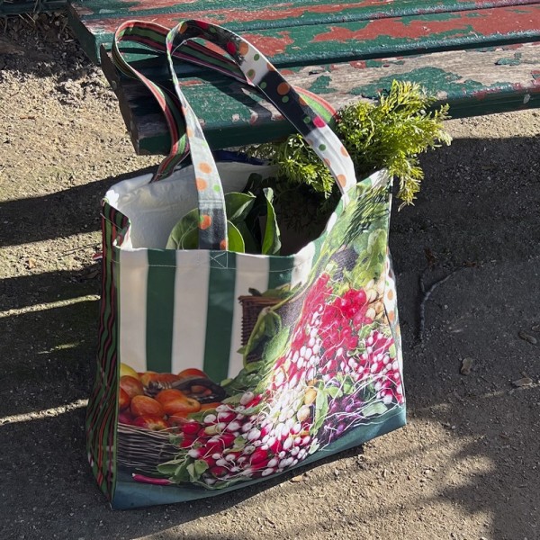 Maron Bouillie reusable grocery bag printed Radishes Carrots filled of shopping placed on a bench - French market bag Maron Bouillie reusable grocery bag printed Radishes Carrots filled of shopping placed on a bench - French market bag