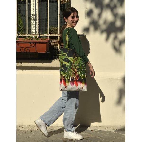 Young girl walking with the Maron Bouillie Winter radishes vegetable market tote bag.