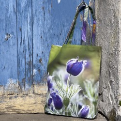 Anemone Flower Tote Bag hanging on a blue door - Designer Bag with Floral Print by Maron Bouillie Made in France 2