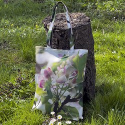Apple Tree Flower Bag lying in the grass on a tree stump - Fabric Tote Bag by Maron Bouillie Made in France