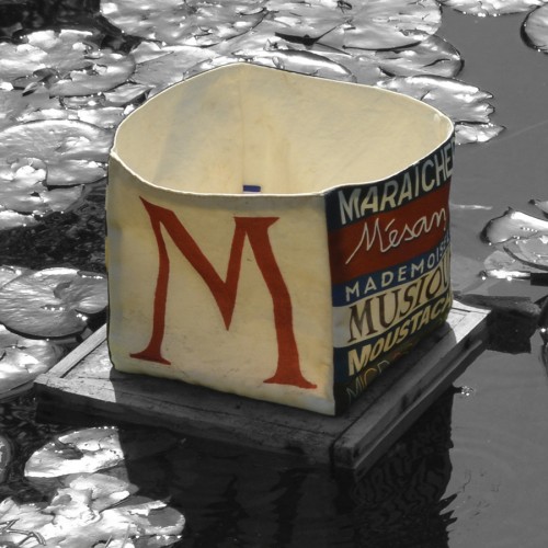 Alphabet letter box M floating on water - Maron Bouillie made in France