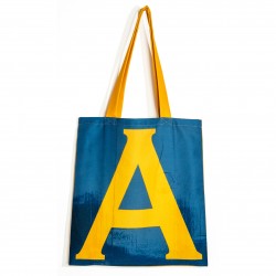 Letter A bag carried by a laughing young girl - French tote bag design by Maron Bouillie 2